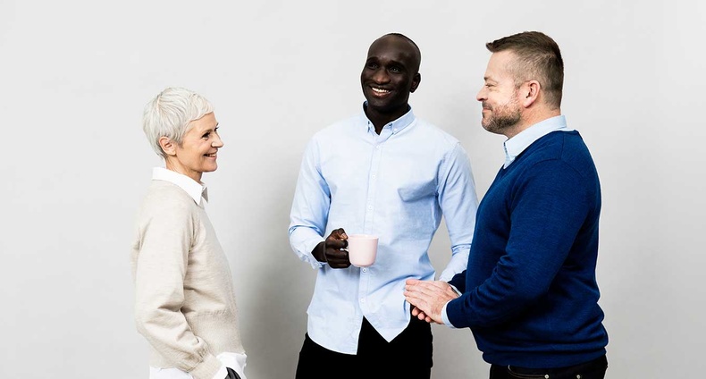 Three people discussing