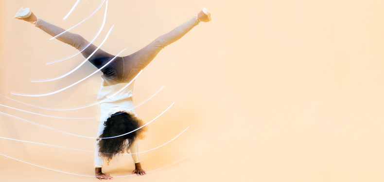 A girl doing a somersault